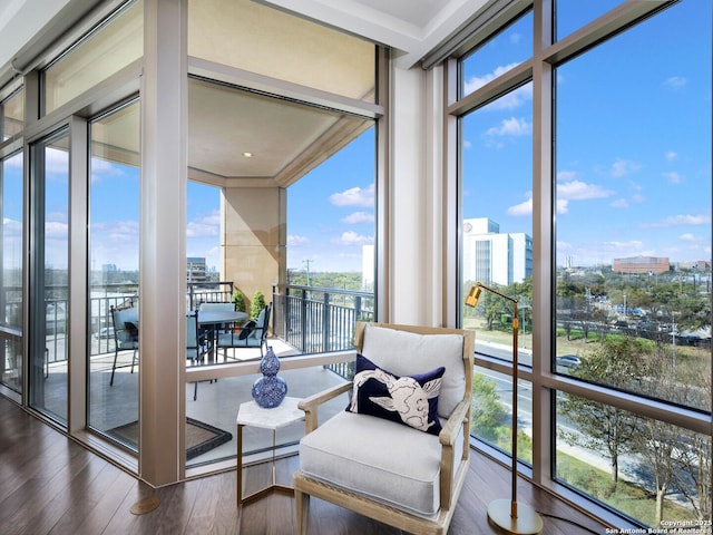 sunroom / solarium with a city view