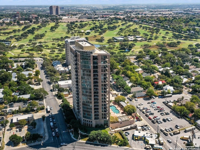 bird's eye view with a view of city and golf course view