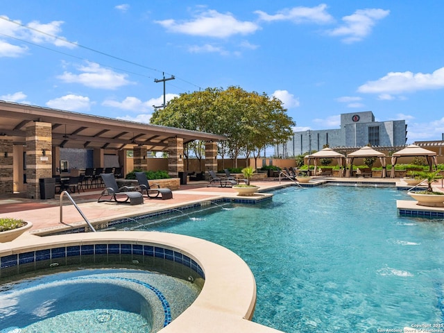 pool with a gazebo, a patio, and a community hot tub