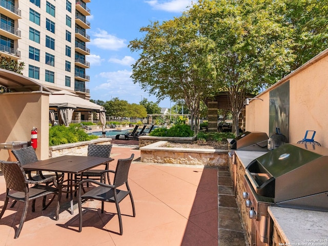 view of patio featuring grilling area