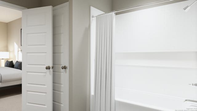 full bath with a shower with curtain and ensuite bathroom