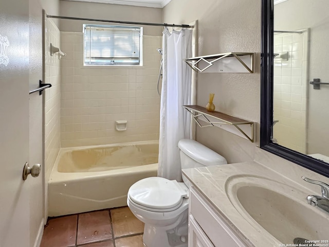 bathroom with tile patterned floors, toilet, shower / tub combo with curtain, vanity, and a textured wall