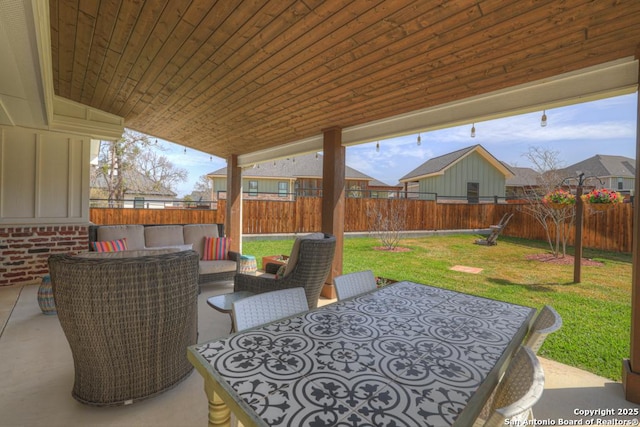 view of patio / terrace featuring outdoor lounge area and a fenced backyard