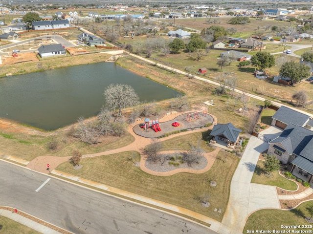 bird's eye view with a water view