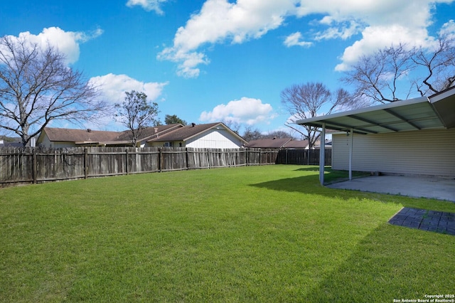 view of yard featuring a patio and a fenced backyard