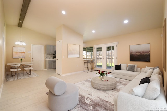 living room featuring an inviting chandelier, lofted ceiling with beams, recessed lighting, and french doors