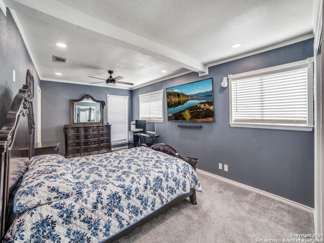 bedroom featuring visible vents, baseboards, beam ceiling, carpet flooring, and a ceiling fan