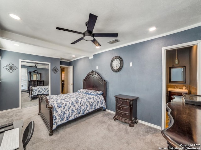 carpeted bedroom featuring recessed lighting, visible vents, baseboards, and ornamental molding