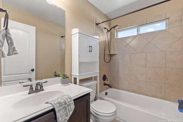 full bathroom featuring shower / bath combination, toilet, and vanity