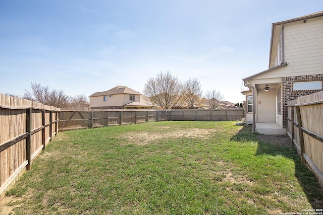 view of yard featuring a fenced backyard