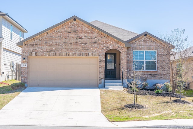 view of front of house with brick siding, an attached garage, concrete driveway, and a shingled roof