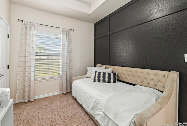 carpeted bedroom with baseboards