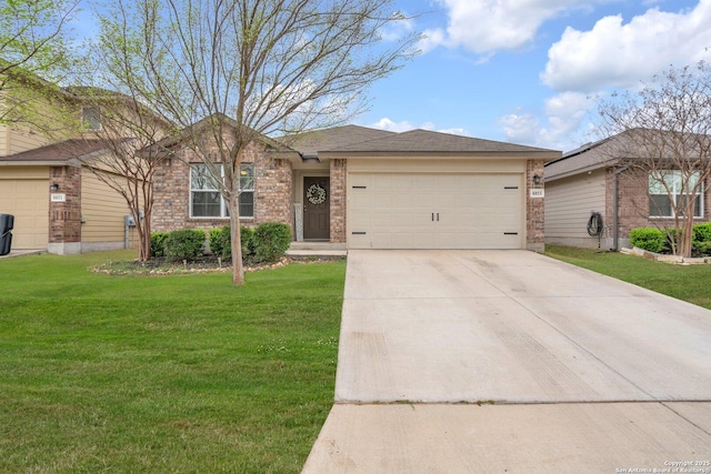 single story home featuring a front yard, an attached garage, brick siding, and driveway