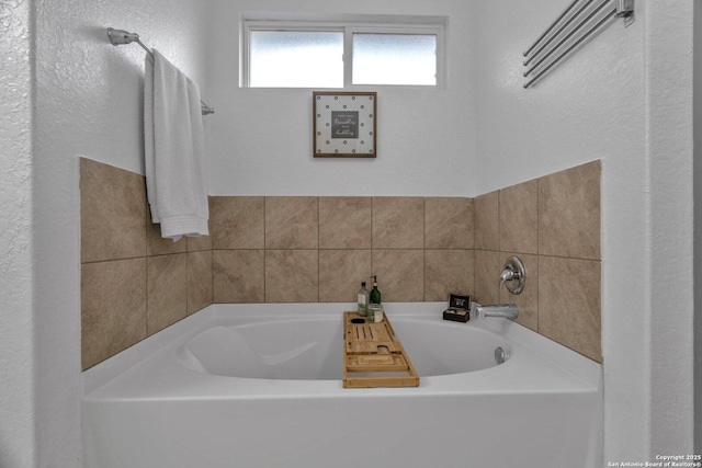 full bath featuring a garden tub