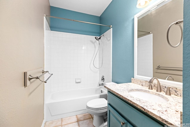 bathroom with tub / shower combination, toilet, vanity, and tile patterned flooring