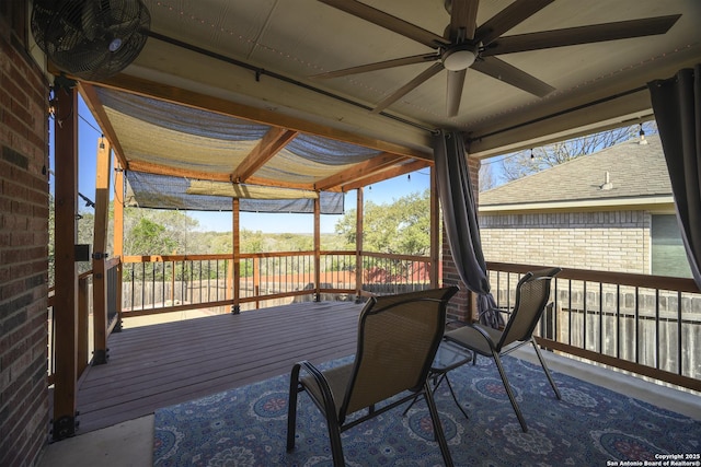 wooden deck with ceiling fan