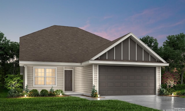 view of front of property with board and batten siding, concrete driveway, an attached garage, and a shingled roof