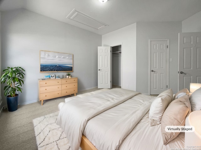 carpeted bedroom with baseboards and attic access