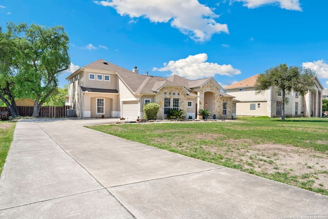 14019 Tahoe Vis, San Antonio, TX 78253 - view of front facade featuring fence, cooling unit, stucco siding, a front lawn, and driveway