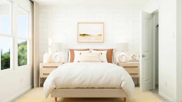 bedroom featuring baseboards