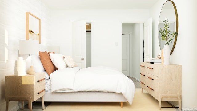 bedroom with light wood-style flooring