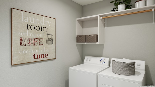 washroom with laundry area and washer and clothes dryer