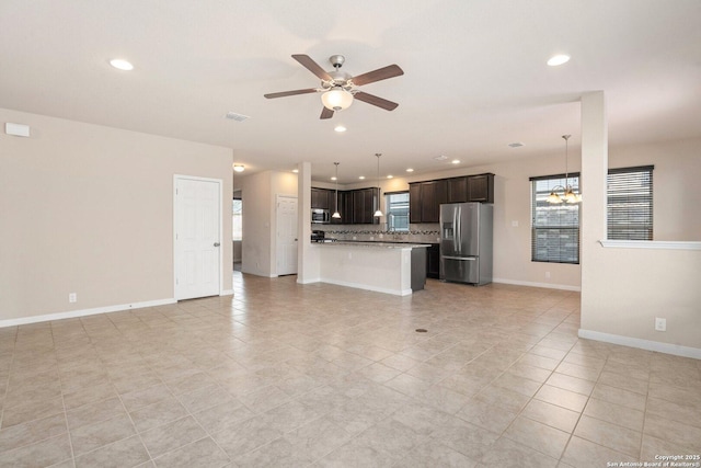 12604 Brite Rnch, San Antonio, TX 78245 - unfurnished living room with visible vents, recessed lighting, baseboards, and a ceiling fan