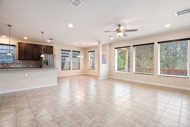 12604 Brite Rnch, San Antonio, TX 78245 - unfurnished living room featuring recessed lighting, light tile patterned floors, a ceiling fan, and visible vents