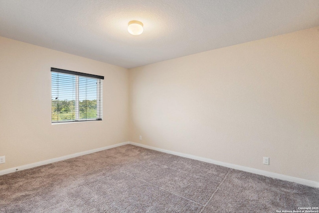 12604 Brite Rnch, San Antonio, TX 78245 - carpeted spare room with baseboards