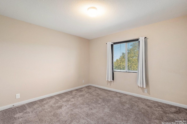 12604 Brite Rnch, San Antonio, TX 78245 - empty room with baseboards and carpet floors