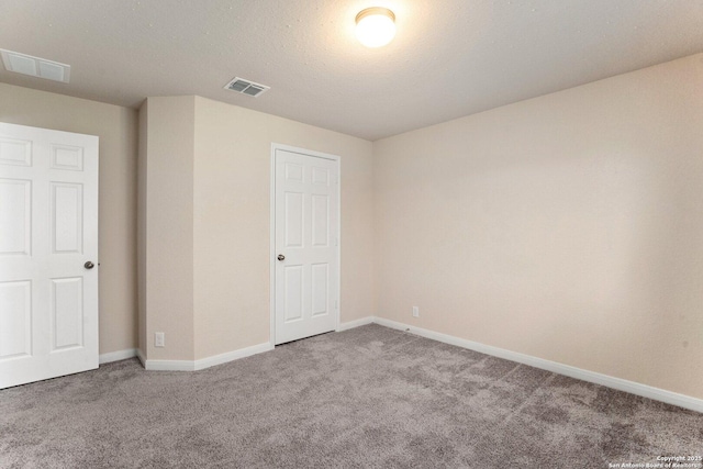 12604 Brite Rnch, San Antonio, TX 78245 - unfurnished bedroom featuring visible vents, baseboards, and carpet floors