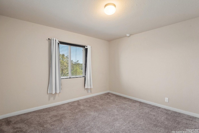 12604 Brite Rnch, San Antonio, TX 78245 - spare room with baseboards and carpet flooring