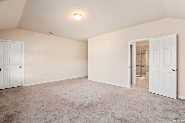 12604 Brite Rnch, San Antonio, TX 78245 - interior space featuring vaulted ceiling, baseboards, visible vents, and carpet floors