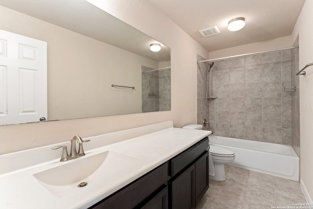 12604 Brite Rnch, San Antonio, TX 78245 - bathroom featuring tile patterned flooring, visible vents, shower / washtub combination, toilet, and vanity