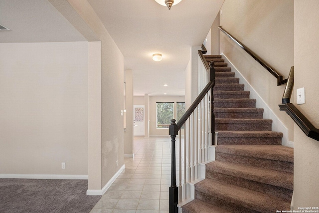 12604 Brite Rnch, San Antonio, TX 78245 - stairs with tile patterned floors, visible vents, and baseboards