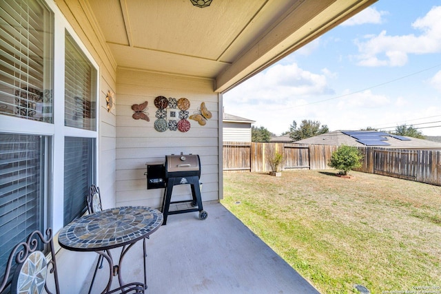 view of patio / terrace with a grill and a fenced backyard