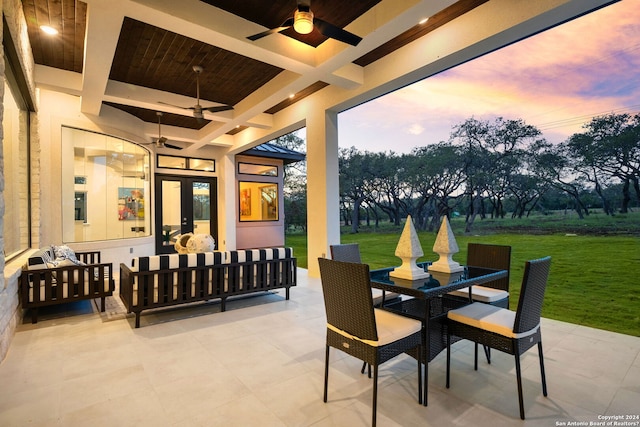 view of patio / terrace featuring an outdoor hangout area, outdoor dining space, and a ceiling fan