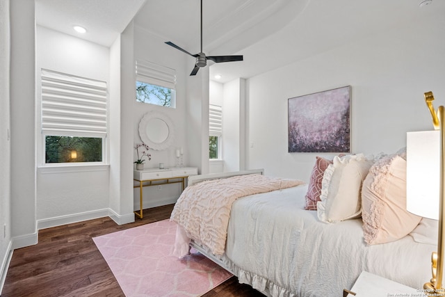 bedroom featuring dark wood finished floors, recessed lighting, baseboards, and ceiling fan