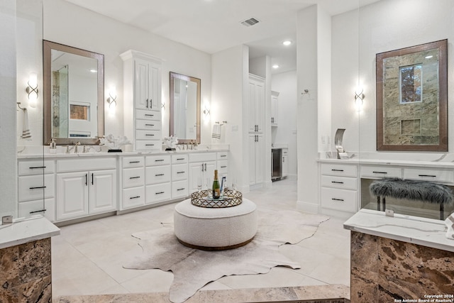 full bathroom with vanity, visible vents, and marble finish floor