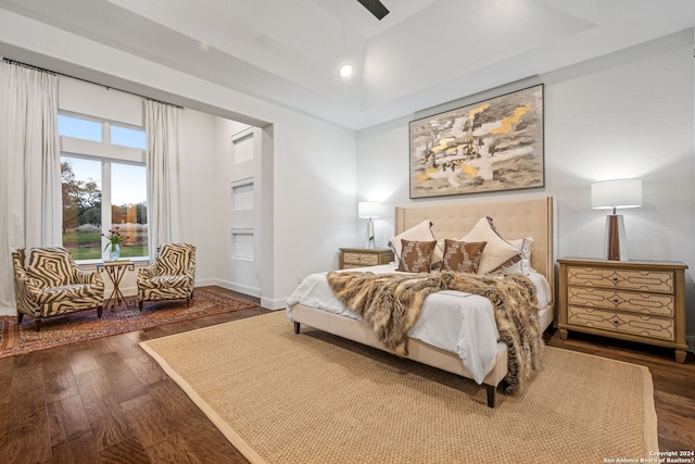 bedroom with recessed lighting, baseboards, and wood finished floors