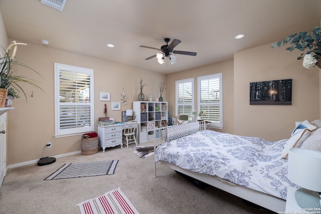 carpeted bedroom with recessed lighting, visible vents, baseboards, and a ceiling fan