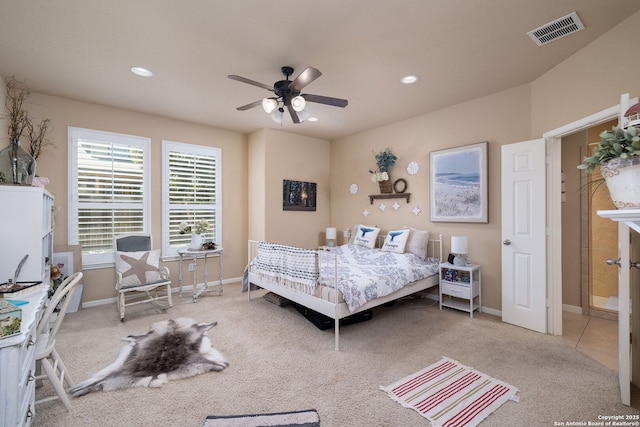 carpeted bedroom with a ceiling fan, recessed lighting, visible vents, and baseboards