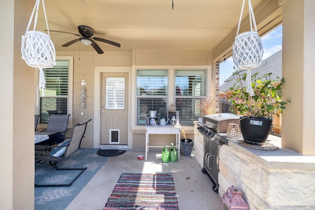 view of patio / terrace featuring a grill and ceiling fan