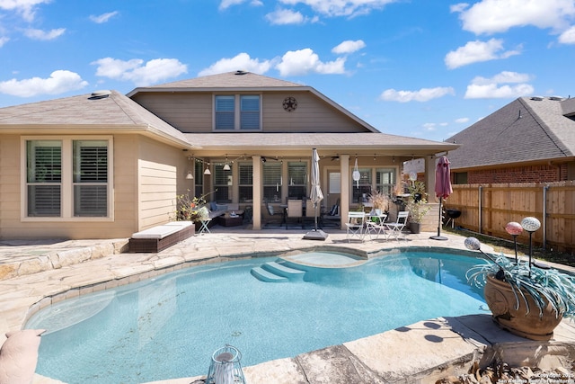 view of pool with a fenced in pool, a ceiling fan, a patio, and fence