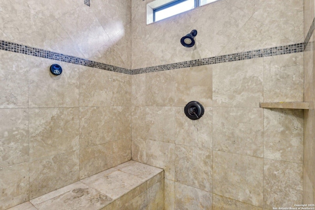 interior space with a tile shower