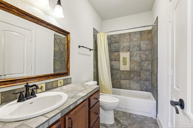 full bath featuring vanity, toilet, and shower / bathtub combination with curtain