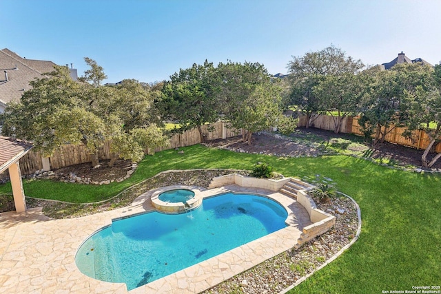 view of swimming pool featuring a yard, a patio, a fenced backyard, and a pool with connected hot tub