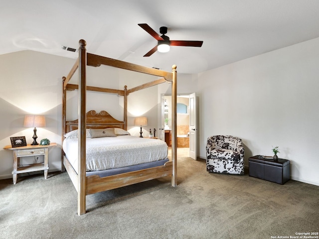 bedroom featuring visible vents, connected bathroom, ceiling fan, lofted ceiling, and carpet floors