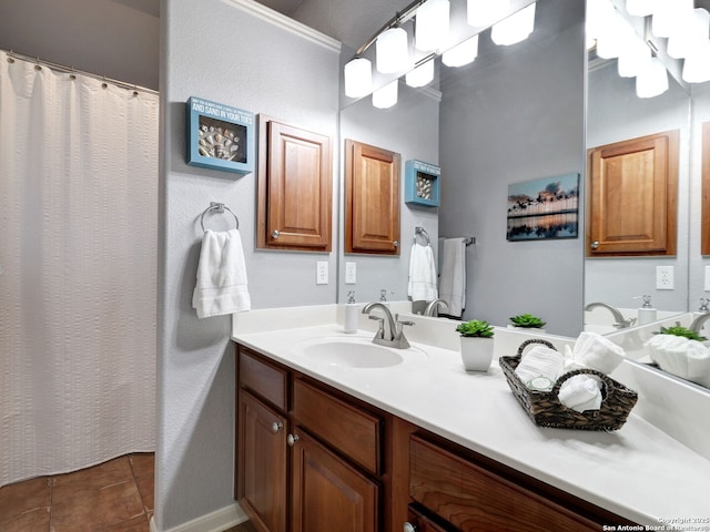 full bathroom with tile patterned floors, a shower with shower curtain, and vanity