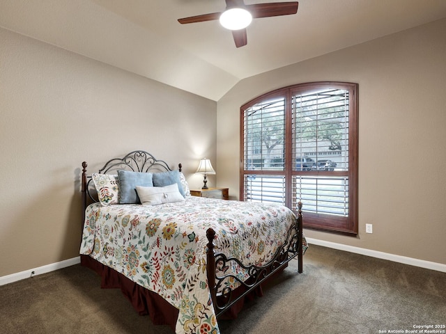 carpeted bedroom with lofted ceiling, baseboards, and ceiling fan